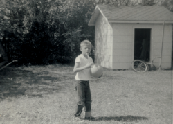 Philip Beyer playing ball in backyard 17th Street BR La.-Use to Jumb off that building